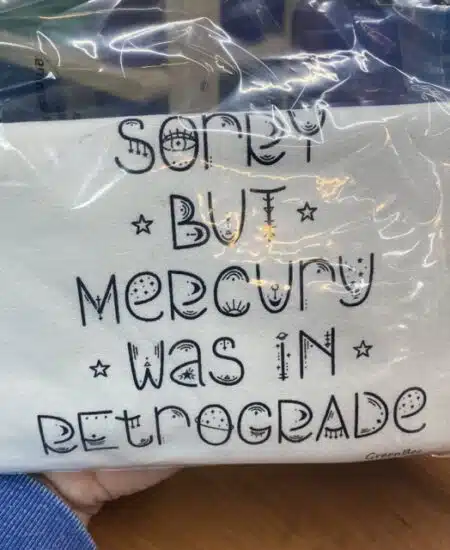 decorative tea towel that says sorry but mercury was in retrograde