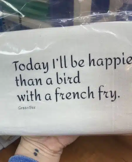 cotton tea towel that says today ill be happier than a bird with a French fry